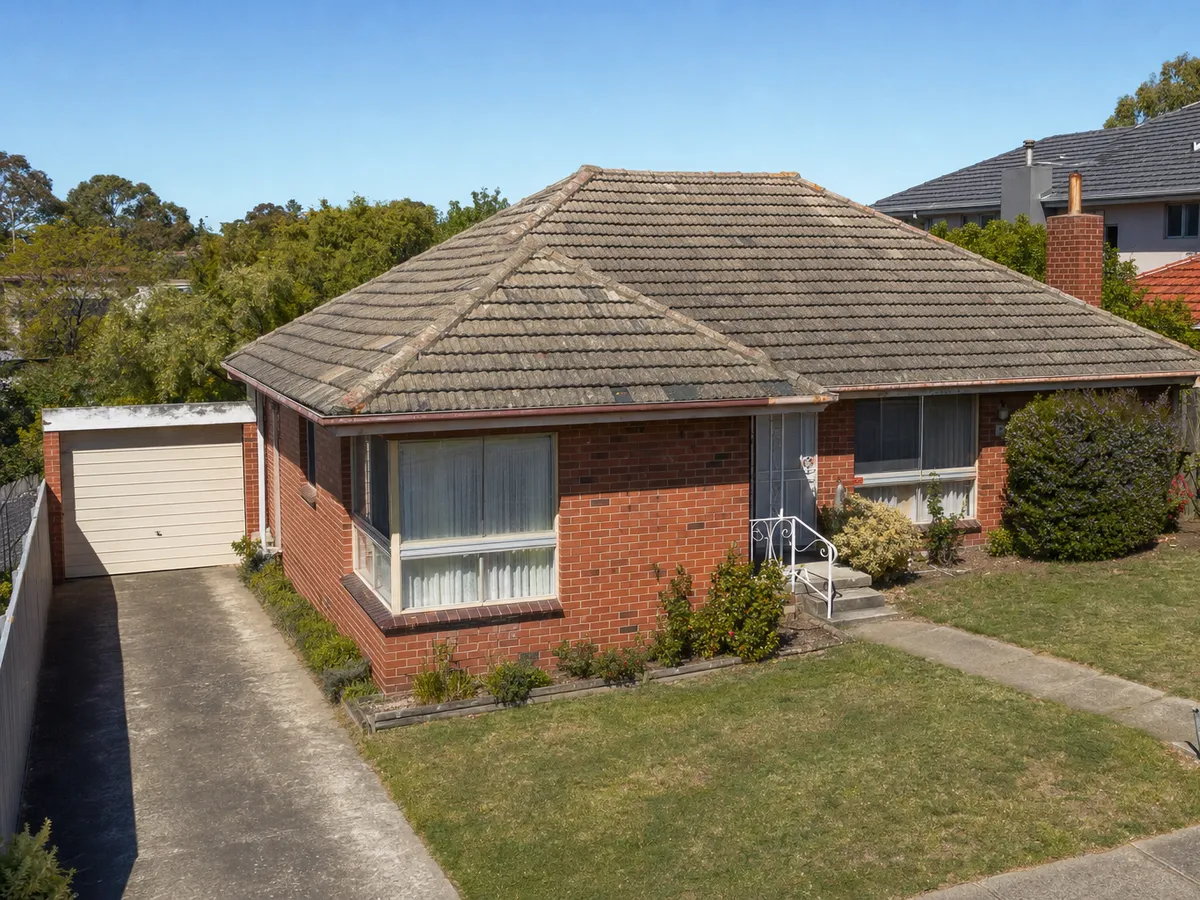 Tile-to-Colorbond Re-Roof in Northern Suburbs — before