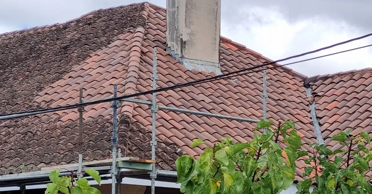 Steep heritage terracotta roof — clean, repair and restoration on full scaffold — Roof Restoration Services Northern Suburbs Melbourne