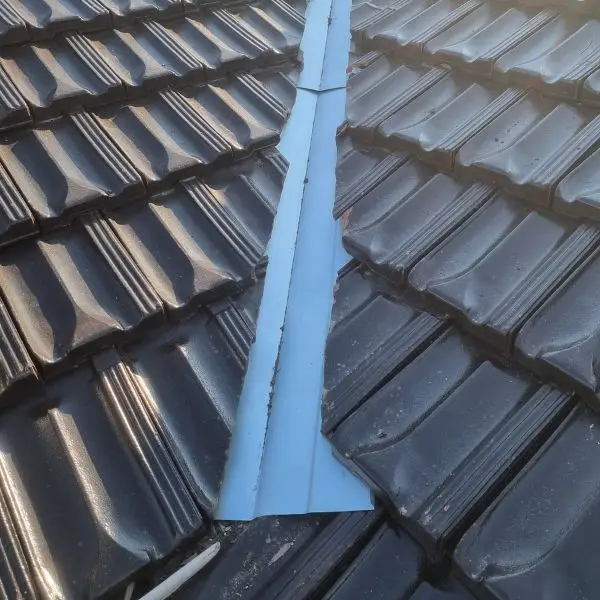 New valley irons installed in a tile roof — Roof Restoration Services Northern Suburbs Melbourne